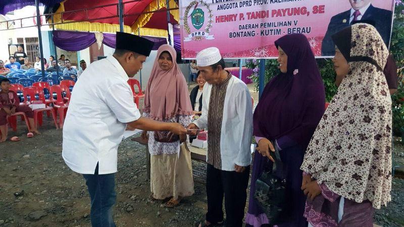 PANUTAN  TOLERANSI BERAGAMA, HENDRY PAILAN DAN KELUARGA GELAR BUKA PUASA BERSAMA WARGA